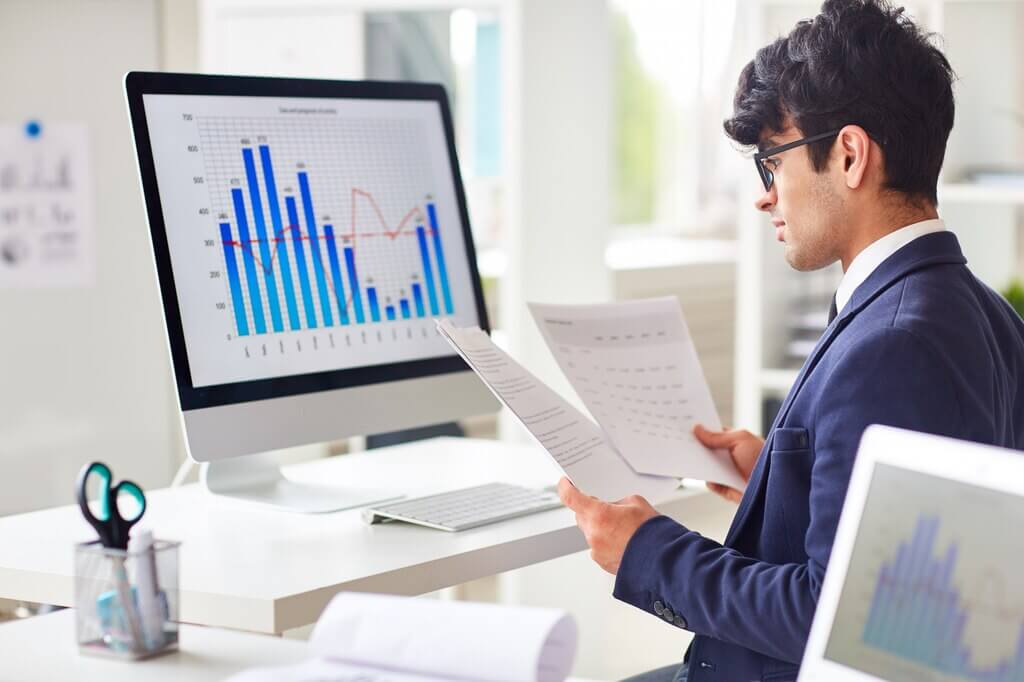 A man doing paper analysis