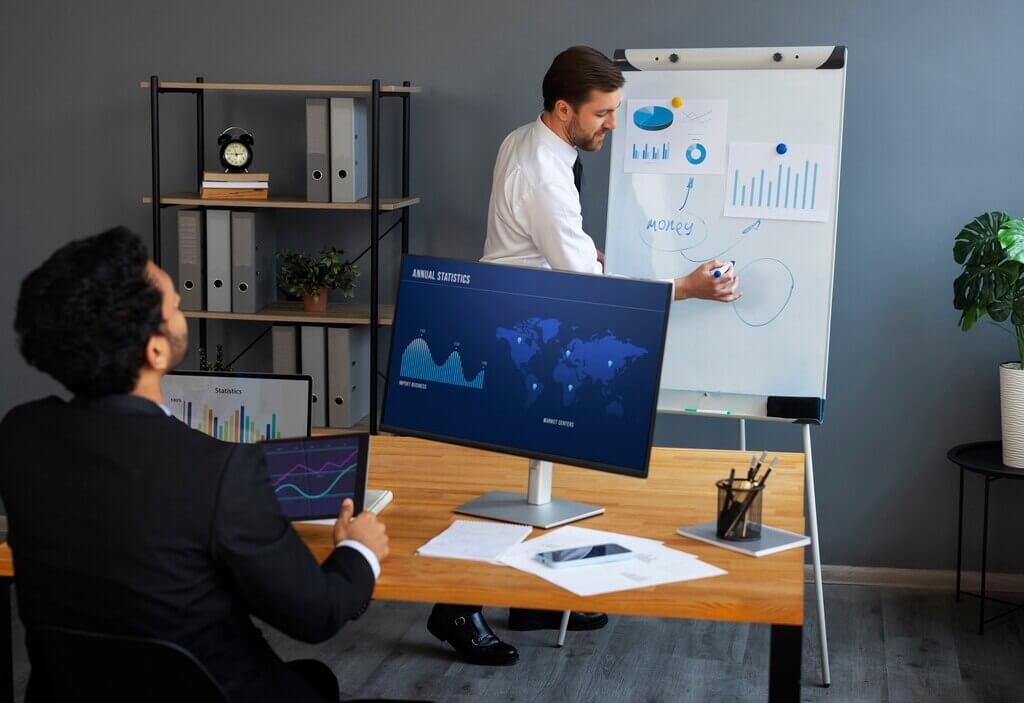 Business person looking finance graphs