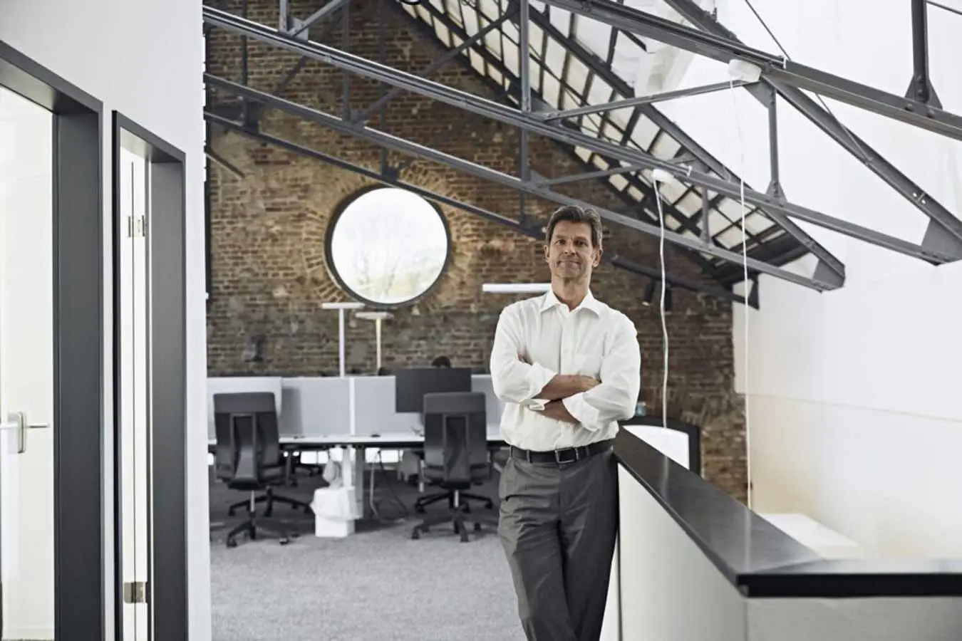 Portrait of mature businessman in modern office